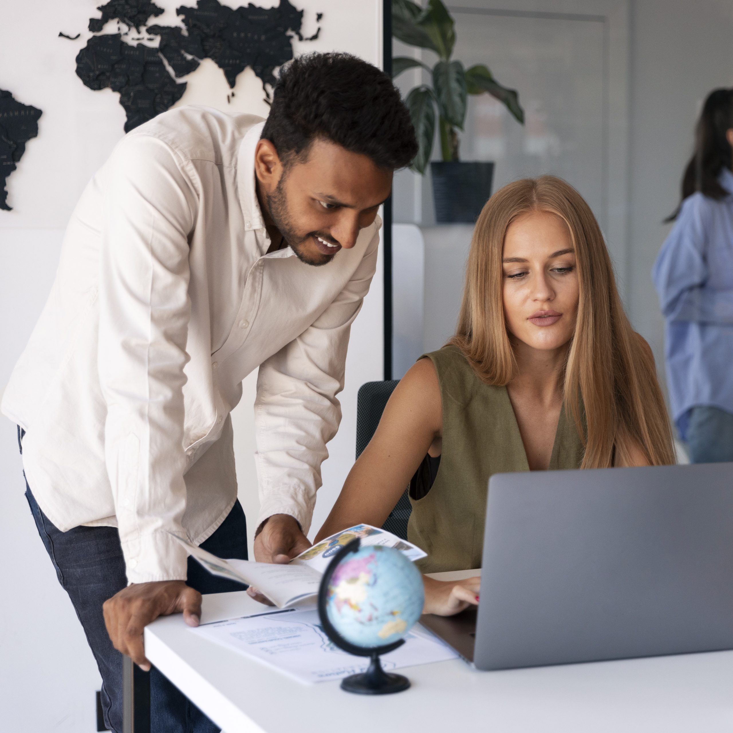 Managers reviewing international hiring plan — recruitment services for finance and corporate sectors