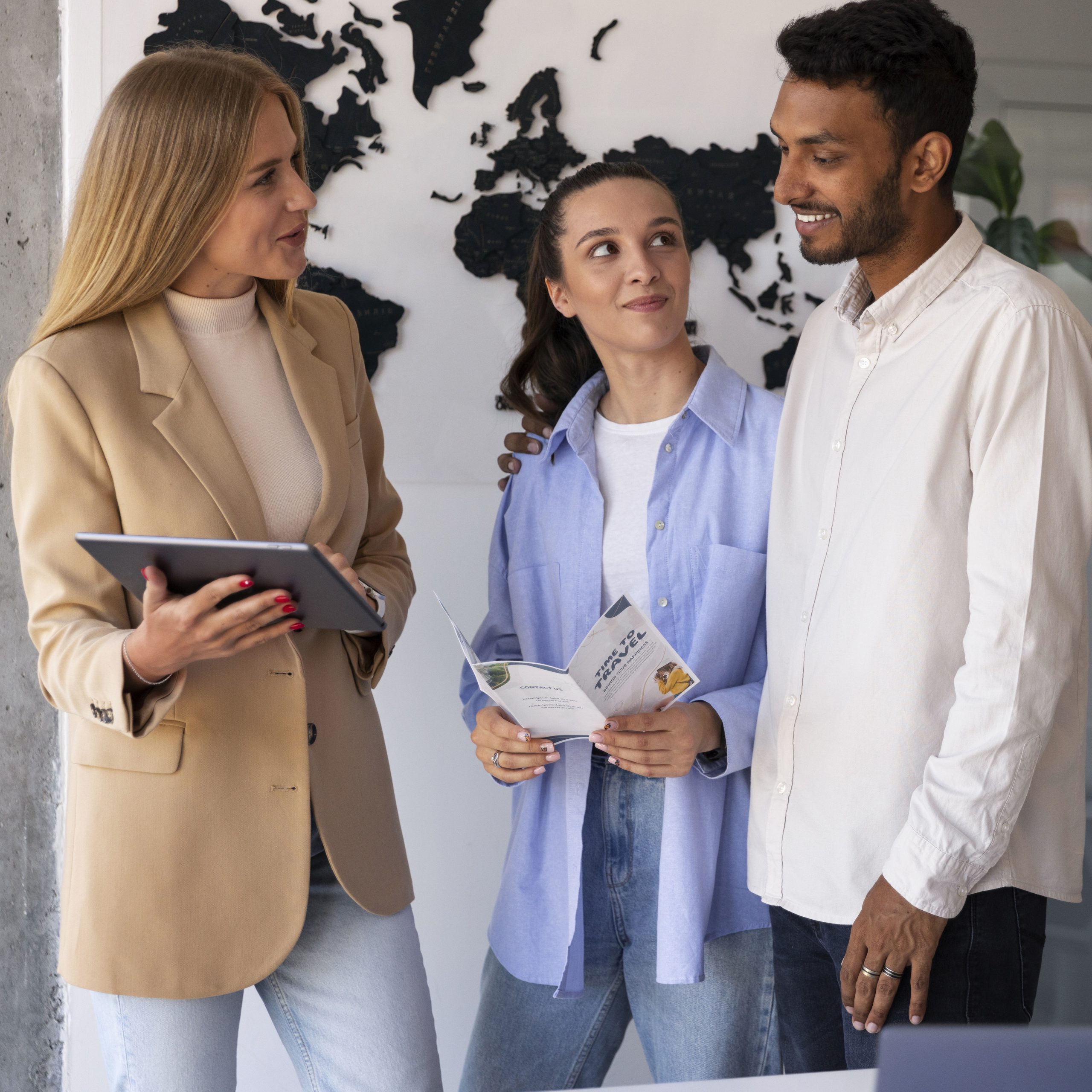 Office professionals collaborating on project strategy — recruitment and staffing services for business and marketing roles