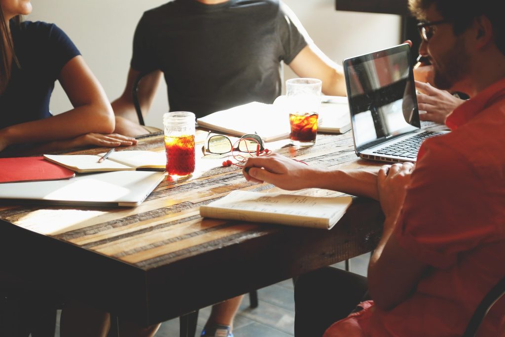 Office team planning staffing strategy — HR and recruitment support for employers